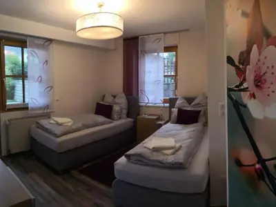 Ein Bett oder Betten in einem Zimmer der Unterkunft Apartment im Naturpark Steinwald by Interhome