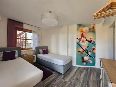 Ein Bett oder Betten in einem Zimmer der Unterkunft Apartment im Naturpark Steinwald by Interhome