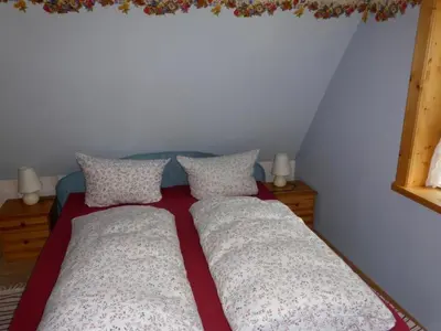 Ein Bett oder Betten in einem Zimmer der Unterkunft Holiday Home Gretelhaus by Interhome