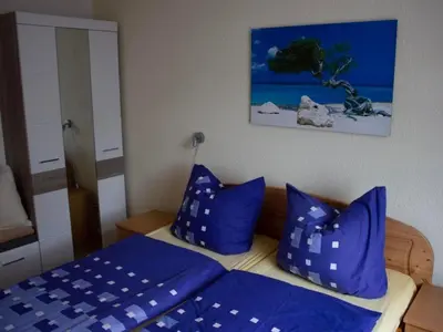 Ein Bett oder Betten in einem Zimmer der Unterkunft Apartment Gisela by Interhome