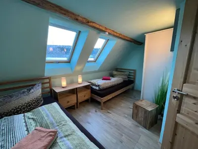 Ein Bett oder Betten in einem Zimmer der Unterkunft Holiday Home Haus Fichtelberg by Interhome