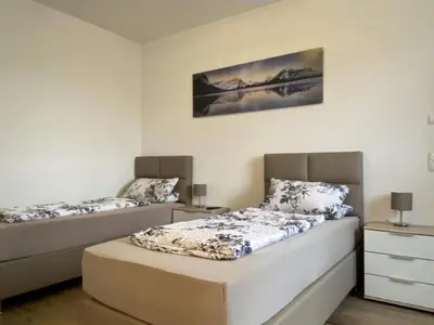 Ein Bett oder Betten in einem Zimmer der Unterkunft Apartment in Heselbach mit Grill- Whirlpool und Garten by Interhome