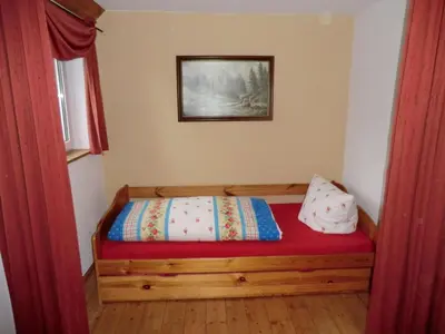 Ein Bett oder Betten in einem Zimmer der Unterkunft Holiday Home Irenahaus by Interhome