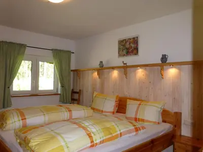 Ein Bett oder Betten in einem Zimmer der Unterkunft Holiday Home Irenahaus by Interhome