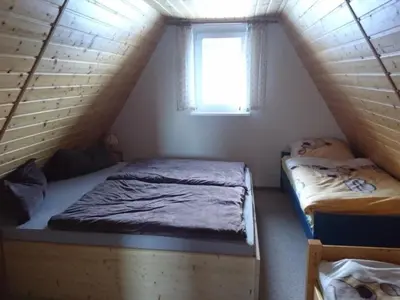 Ein Bett oder Betten in einem Zimmer der Unterkunft Holiday Home Glück Auf! by Interhome