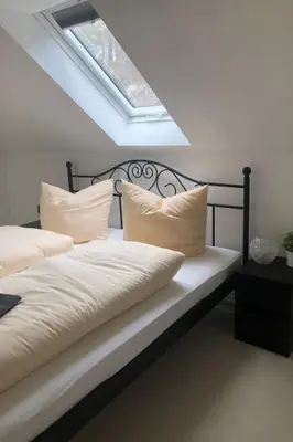 Ein Bett oder Betten in einem Zimmer der Unterkunft Apartment Fe-Wo Parkblick by Interhome
