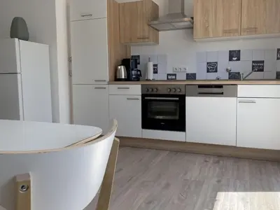 Küche/Küchenzeile in der Unterkunft Apartment SAD151 Moderne Monteurwohnung mit Balkon by Interhome