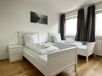 Ein Bett oder Betten in einem Zimmer der Unterkunft Apartment SAD152 by Interhome