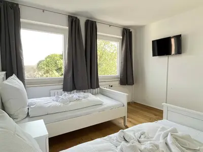 Ein Bett oder Betten in einem Zimmer der Unterkunft Apartment SAD152 by Interhome