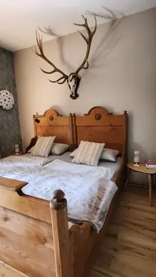 Ein Bett oder Betten in einem Zimmer der Unterkunft Waldliebe - Wohnung mit großem Balkon und Burgblick