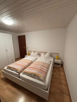 Ein Bett oder Betten in einem Zimmer der Unterkunft Haus Waldesruh