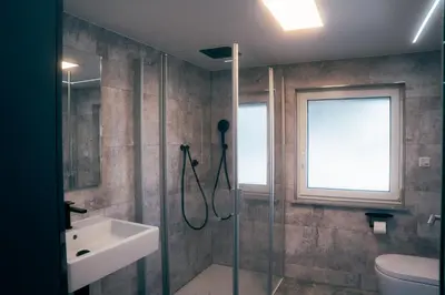 Ein Badezimmer in der Unterkunft Luxus-Ferienhaus, Wellness, Absolute Ruhe
