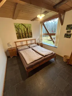 Ein Bett oder Betten in einem Zimmer der Unterkunft Künstlerwohnung