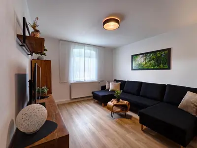 Ein Sitzbereich in der Unterkunft Ferienhaus WALDNAH
