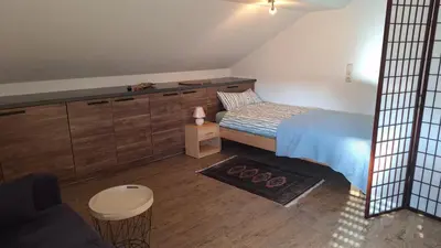 Ein Bett oder Betten in einem Zimmer der Unterkunft Sunset Apartment