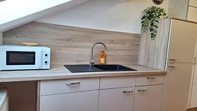 Küche/Küchenzeile in der Unterkunft Sunset Apartment