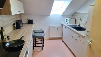 Küche/Küchenzeile in der Unterkunft Sunset Apartment