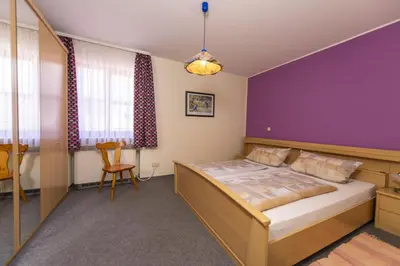 Ein Bett oder Betten in einem Zimmer der Unterkunft Pension Ferienwohnungen Frey