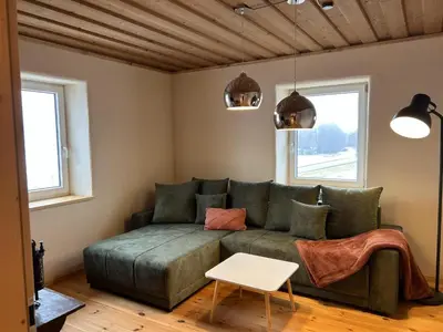Ein Sitzbereich in der Unterkunft Ferienhaus Bergheiner