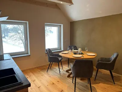 Ein Sitzbereich in der Unterkunft Ferienhaus Bergheiner