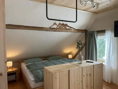Ein Bett oder Betten in einem Zimmer der Unterkunft Ferienhaus Bergheiner