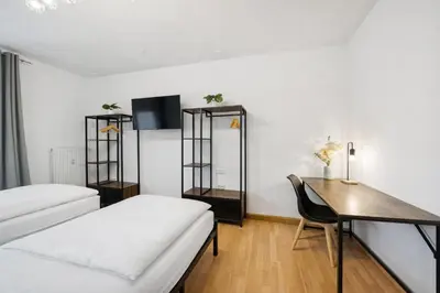 Ein Bett oder Betten in einem Zimmer der Unterkunft Geräumige Wohnung, 3 Schlafzimmer, Küche, Bad
