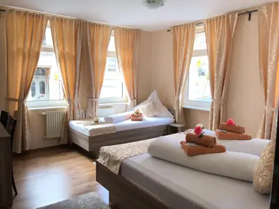Ein Bett oder Betten in einem Zimmer der Unterkunft Hotel Goldenesvogtland