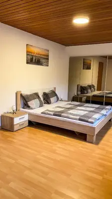 Ein Bett oder Betten in einem Zimmer der Unterkunft Ferienwohnung Merz 26