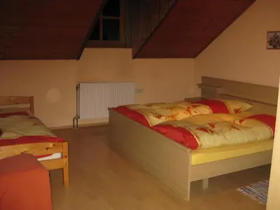 Ein Bett oder Betten in einem Zimmer der Unterkunft Ferienhof Beimler