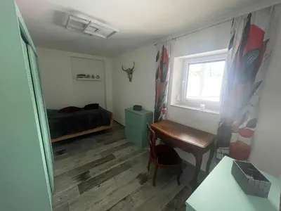 Ein Bett oder Betten in einem Zimmer der Unterkunft OK-City