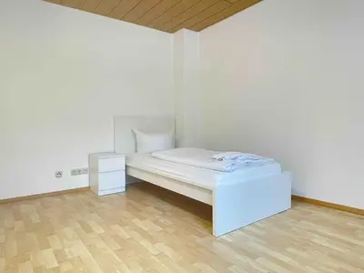 Ein Bett oder Betten in einem Zimmer der Unterkunft WEN111 große Monteurwohnung