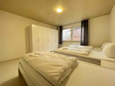 Ein Bett oder Betten in einem Zimmer der Unterkunft SAD155 moderne Monteurwohnung