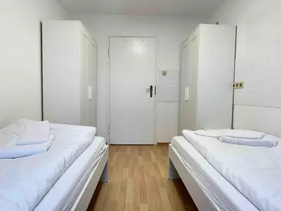 Ein Bett oder Betten in einem Zimmer der Unterkunft SAD155 moderne Monteurwohnung