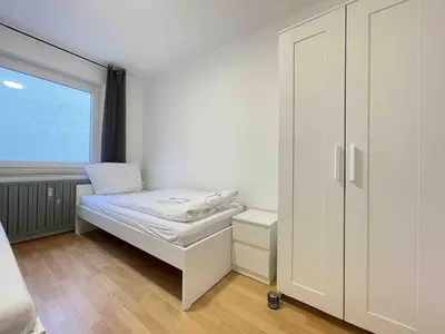 Ein Bett oder Betten in einem Zimmer der Unterkunft SAD155 moderne Monteurwohnung