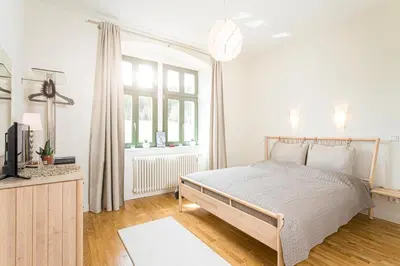 Ein Bett oder Betten in einem Zimmer der Unterkunft Alte Försterei Wildenthal am Kammweg Erzgebirge Ferienwohnung 4
