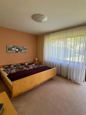 Ein Bett oder Betten in einem Zimmer der Unterkunft Ferienhaus Altenplos