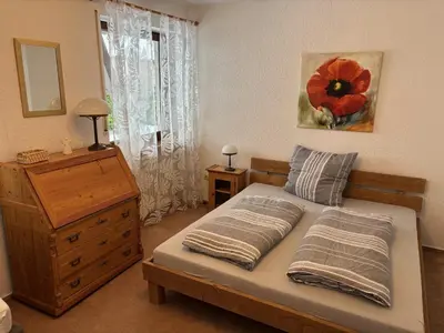 Ein Bett oder Betten in einem Zimmer der Unterkunft Ferienhaus Altenplos
