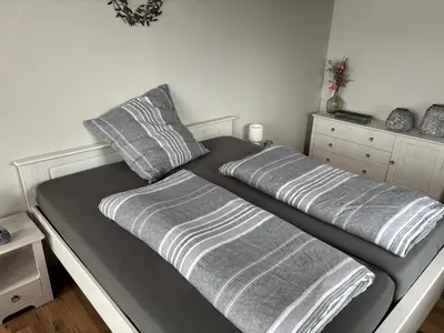 Ein Bett oder Betten in einem Zimmer der Unterkunft Ferienhaus Altenplos