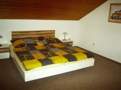 Ein Bett oder Betten in einem Zimmer der Unterkunft Haus Evi