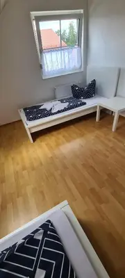 Ein Bett oder Betten in einem Zimmer der Unterkunft Ferien Haus in Wackersdorf ID WA101