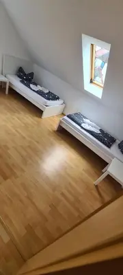 Ein Bett oder Betten in einem Zimmer der Unterkunft Ferien Haus in Wackersdorf ID WA101