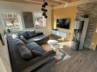 Ein Sitzbereich in der Unterkunft Brückelsee-Chalet