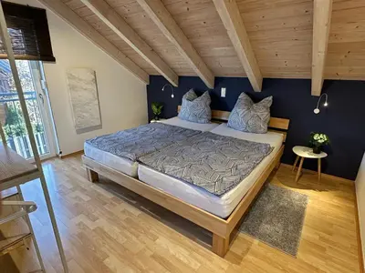 Ein Bett oder Betten in einem Zimmer der Unterkunft Brückelsee-Chalet