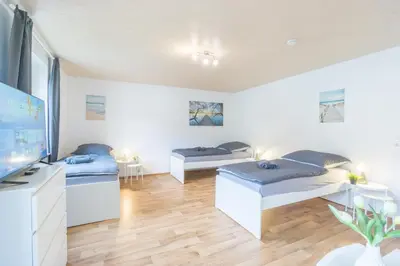 Ein Bett oder Betten in einem Zimmer der Unterkunft Wohnung bei Kulmbach, Bayreuth, Bamberg, Lichtenfels, Kasendorf, Hollfeld KU04