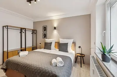 Ein Bett oder Betten in einem Zimmer der Unterkunft Stadtbuden mit Charme - Küche, Wohnzimmer, Kaffee- und Teebar und Garten