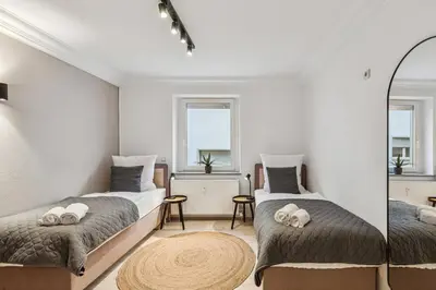 Ein Bett oder Betten in einem Zimmer der Unterkunft Stadtbuden mit Charme - Küche, Wohnzimmer, Kaffee- und Teebar und Garten