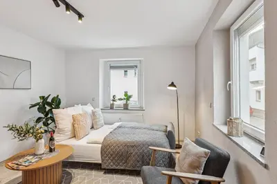 Ein Bett oder Betten in einem Zimmer der Unterkunft Stadtbuden mit Charme - Küche, Wohnzimmer, Kaffee- und Teebar und Garten
