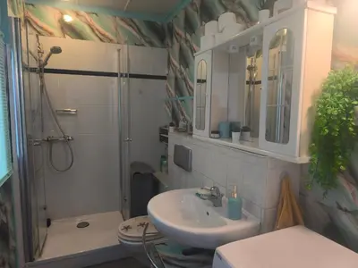 Ein Badezimmer in der Unterkunft Diana Apartments