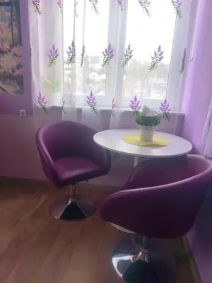 Ein Sitzbereich in der Unterkunft Diana Apartments