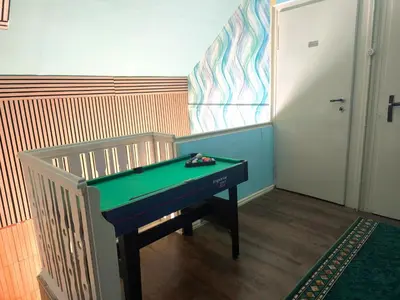 Ein Billardtisch in der Unterkunft Diana Apartments